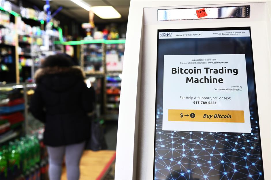 a tesla for a bitcoin: musk drives up cryptocurrency price with us$1.5b purchase